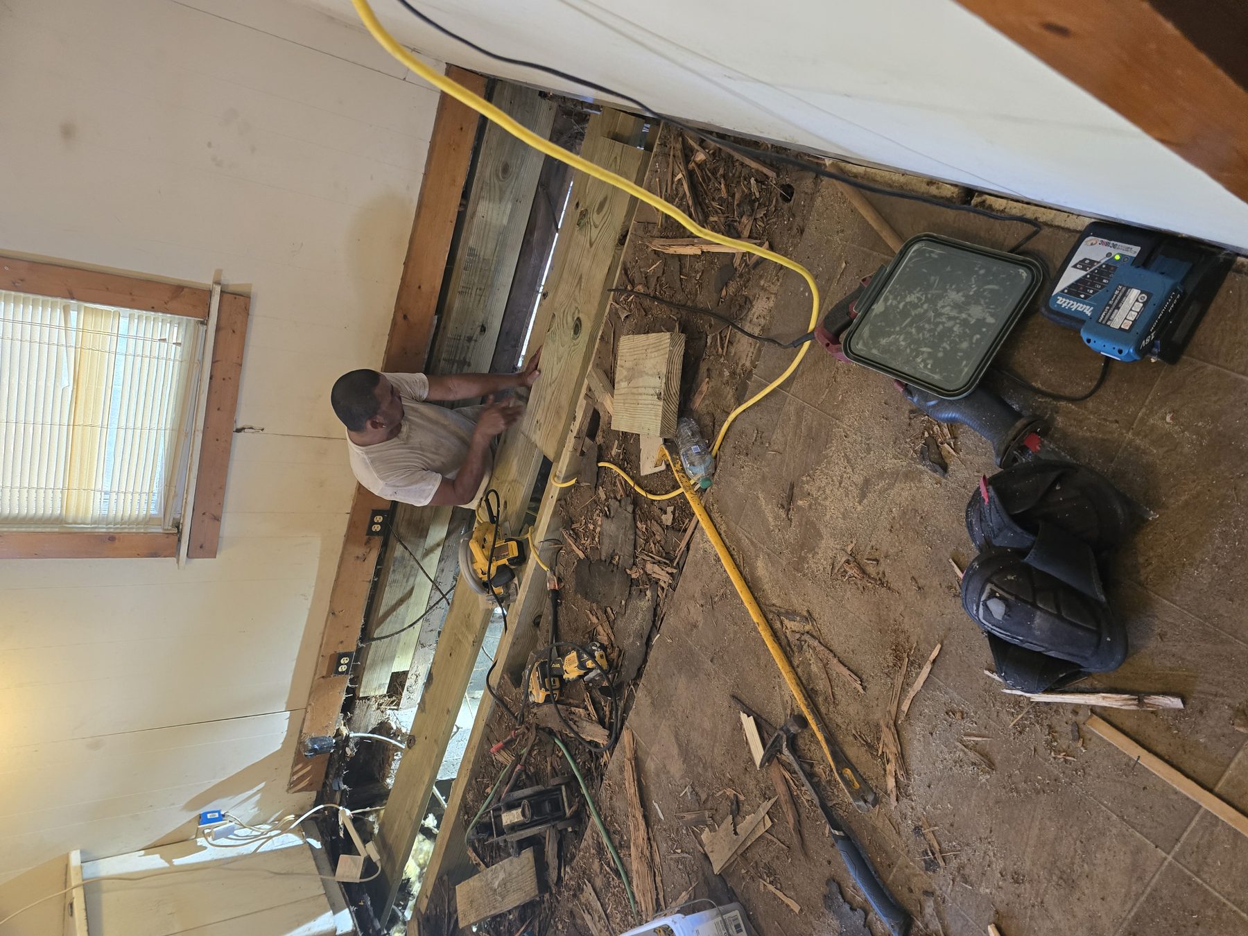 Jack, saw, and a straight joist. The finish floor sits on this.